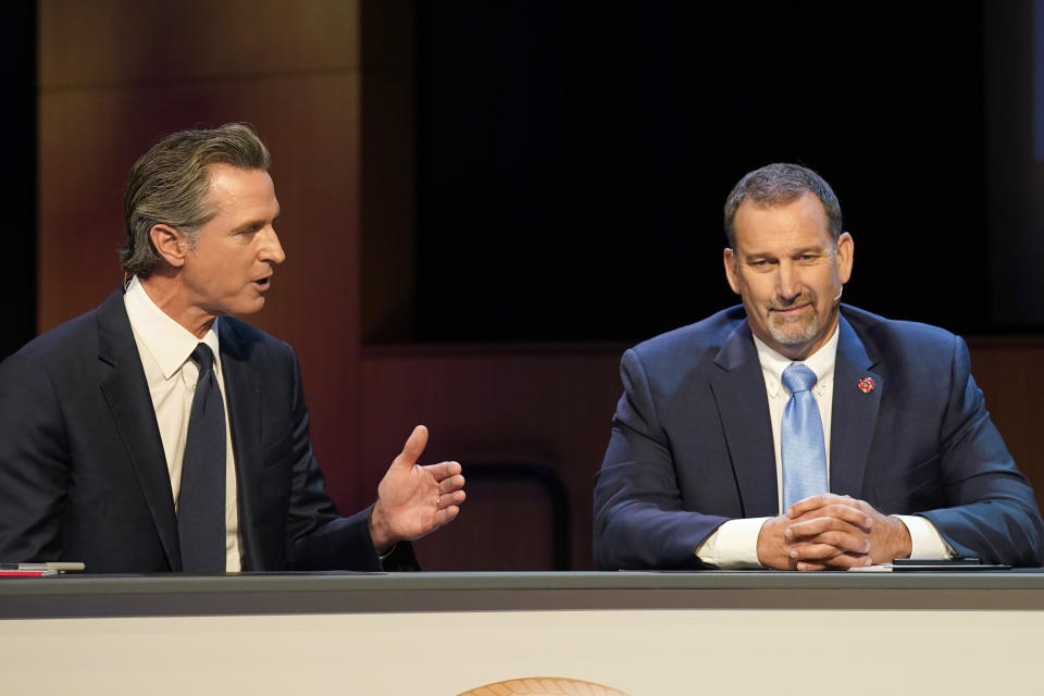 Gubernatorial candidates Democratic Gov. Gavin Newsom, left, and Republican challenger state Sen. Brian Dahle spar during their debate held by KQED Public Television in San Francisco, on Sunday, Oct. 23, 2022. (AP Photo/Rich Pedroncelli, Pool)