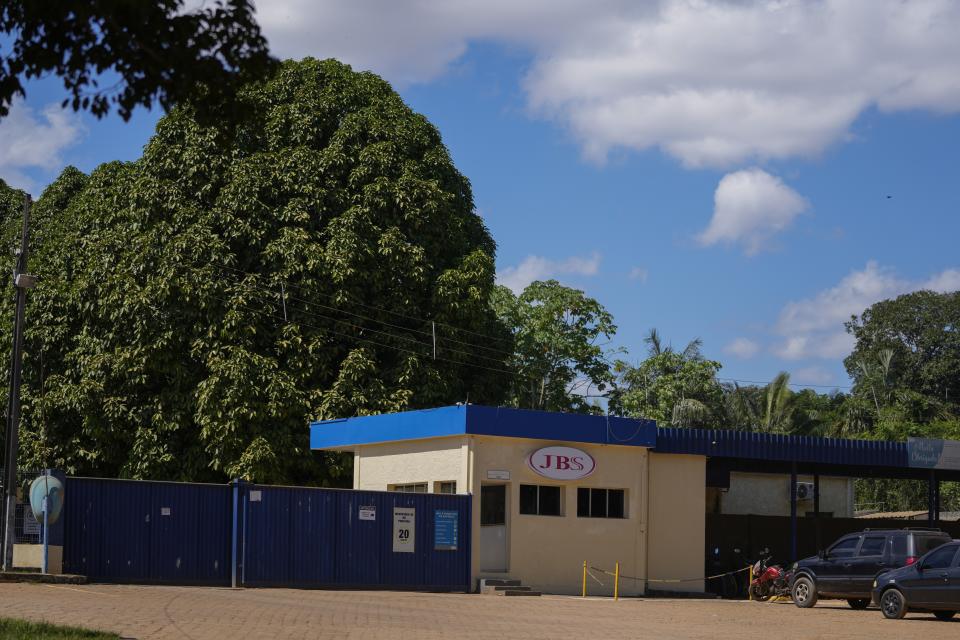 FILE - The main entrance of the meat processing company JBS is visible in Porto Velho, Rondonia state, Brazil, Wednesday, July 12, 2023. Some lawmakers and environmental groups are opposed to JBS being listed on the New York Stock Exchange, arguing that expanded capital would allow the company, responsible for much deforestation in the Amazon rainforest, to do even more harm. (AP Photo/Andre Penner, File)