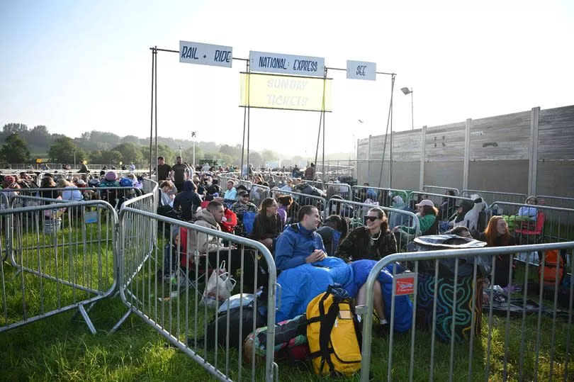 Visitors queue ahead of gates opening at 8am during day one of Glastonbury Festival 2024
