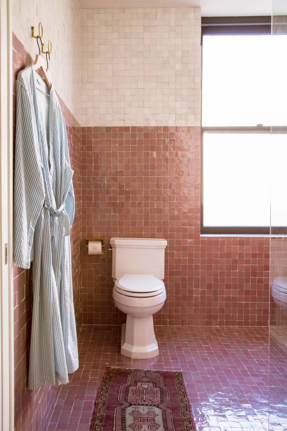 and the Violet Room's rosy two-tone bathroom.