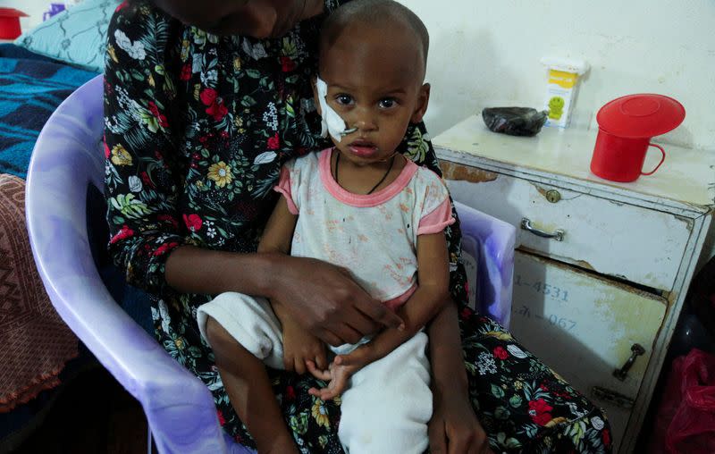 FILE PHOTO: Aamanuel Merhawi, aged one year and eight months, who suffers from severe acute malnutrition, is seen fitted with a nasogastric tube at Wukro hospital in Wukro, Tigray region, Ethiopia July 11 2021. Picture taken July 11, 2021