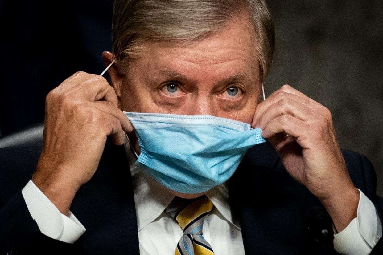 A Democratic lobbyist is under fire for tweeting about how she hops Lindsey Graham dies of his recently announced diagnosis of Covid. (REUTERS)