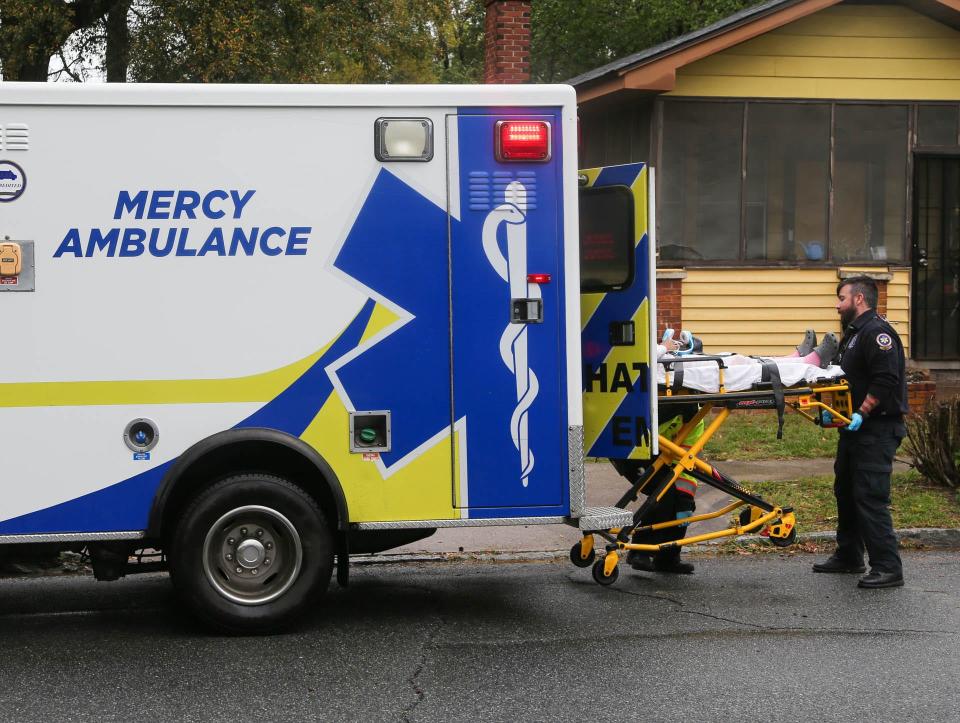 Paramedic Chris Barbella helps load a patient into a Chatham EMS ambulance for transport to a local hospital on Friday March 10, 2023.