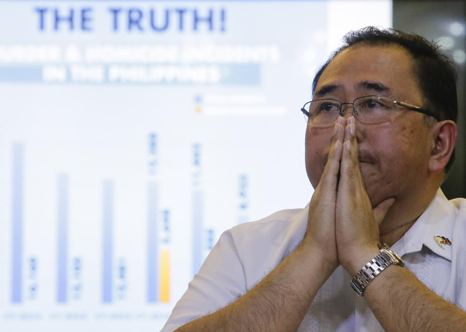 Undersecretary Severo Catura, executive director of the Presidential Human Rights Committee secretariat, gestures as he listens to questions from reporters during a news conference in metropolitan Manila, Philippines, Thursday, July 18, 2019. A Philippine official says thousands of police officers have received administrative punishments, and more than 2,000 were dismissed, for wrongdoings during raids where drug suspects were killed. (AP Photo/Aaron Favila)