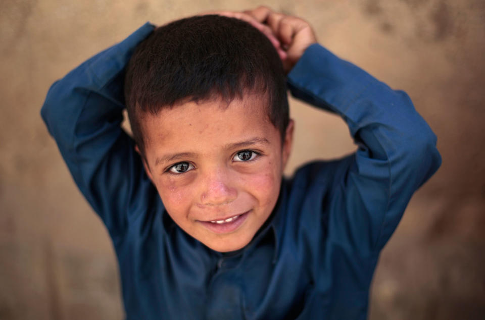 <p>Ahmed Ameen, 5, waits his turn to receive a polio vaccination during a house-to-house polio immunization campaign in Sanaa, Yemen, Tuesday, Feb. 21, 2017. (AP Photo/Hani Mohammed) </p>