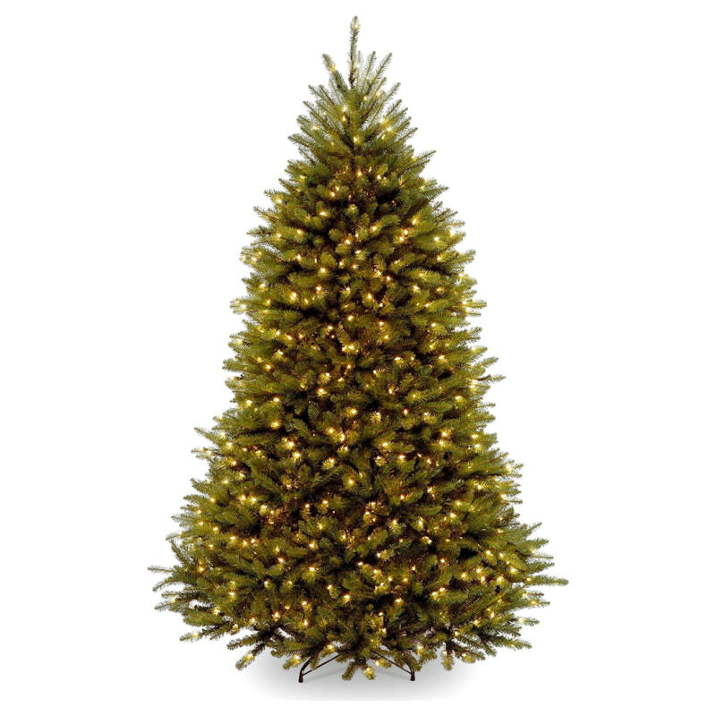 <p>Amazon</p><p>If you’re in the market for a picture-perfect tree that’s at least 6-foot tall and has wide, full branches, you’re in luck. This one made of green Dunhill fir is a stellar choice, especially while it’s on sale for $143 off. </p>