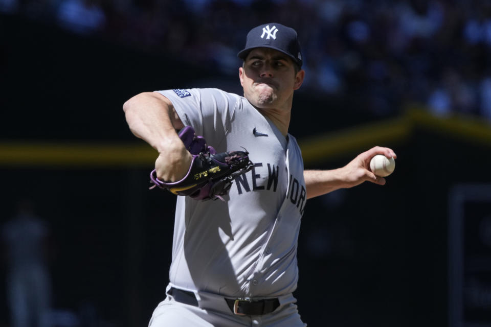 New York Yankees pitcher Carlos Rodon throws against the Arizona Diamondbacks in the first inning during a baseball game, Wednesday, April 3, 2024, in Phoenix. (AP Photo/Rick Scuteri)