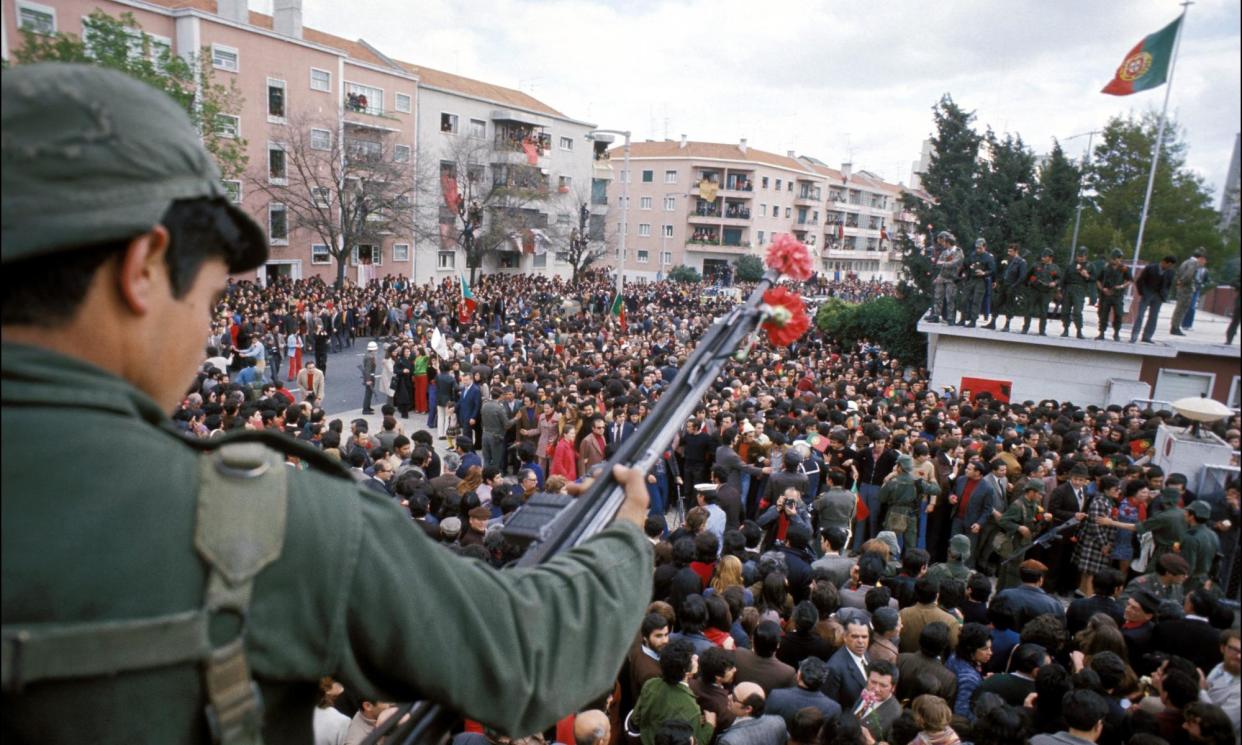 <span>This year is the 50th anniversary of Portugal’s Carnation Revolution in Lisbon, which started on 25 April 1974.</span><span>Photograph: Jean-Claude Francolon/Gamma-Rapho/Getty</span>