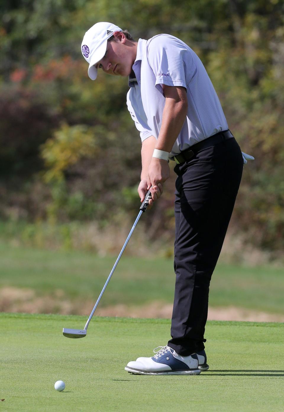 Ted Hoover of Jackson putts on the ninth hole during the DI sectional boys golf tournament at Tannenhauf Golf Club on Tuesday, Oct. 5, 2021.