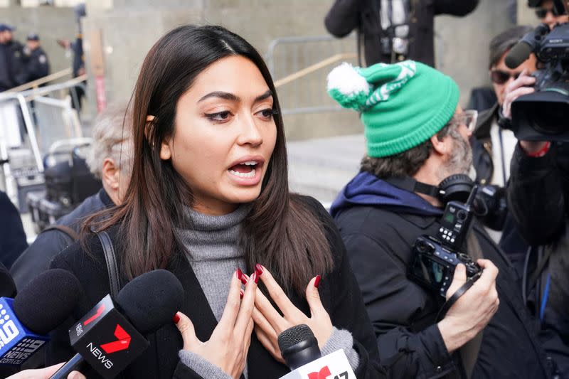 Model Ambra Battilana Gutierrez talks to the media following film producer Harvey Weinstein's guilty verdict in his sexual assault trial in New York