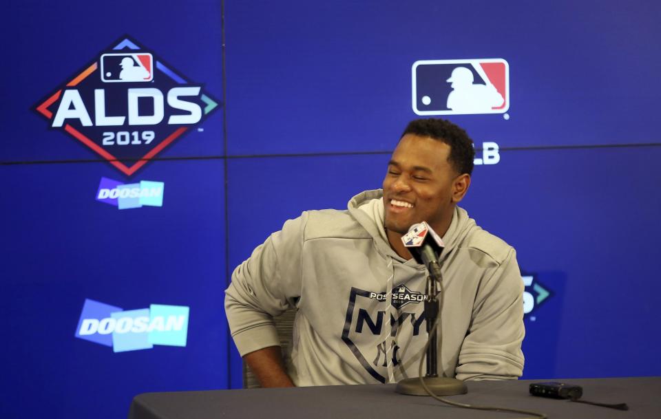 New York Yankees pitcher Luis Severino laughs at a question from the media Sunday, Oct. 6, 2019, in Minneapolis as the team prepares for Game 3 of the American League Division Series baseball playoffs against the Minnesota Twins. (AP Photo/Jim Mone)