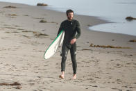 <p>Miley’s man hit the surf in Malibu on Wedneday with his brother Luke. Before getting back in their car and heading home, the Aussie brothers stripped out of their wetsuits and changed their clothes on the side of the road! Quite a treat for passersby, if you ask us. (Photo: RMBI/BACKGRID) </p>