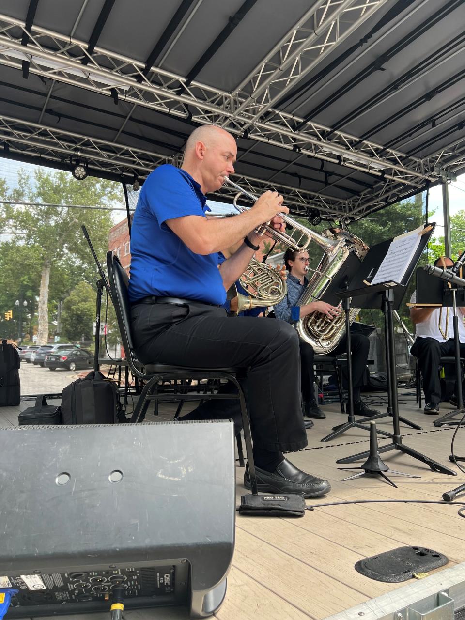 Wichita State University professor and Lancaster Festival Orchestra member David Hunsicker performs with the orchestra brass quintet Monday in downtown Lancaster