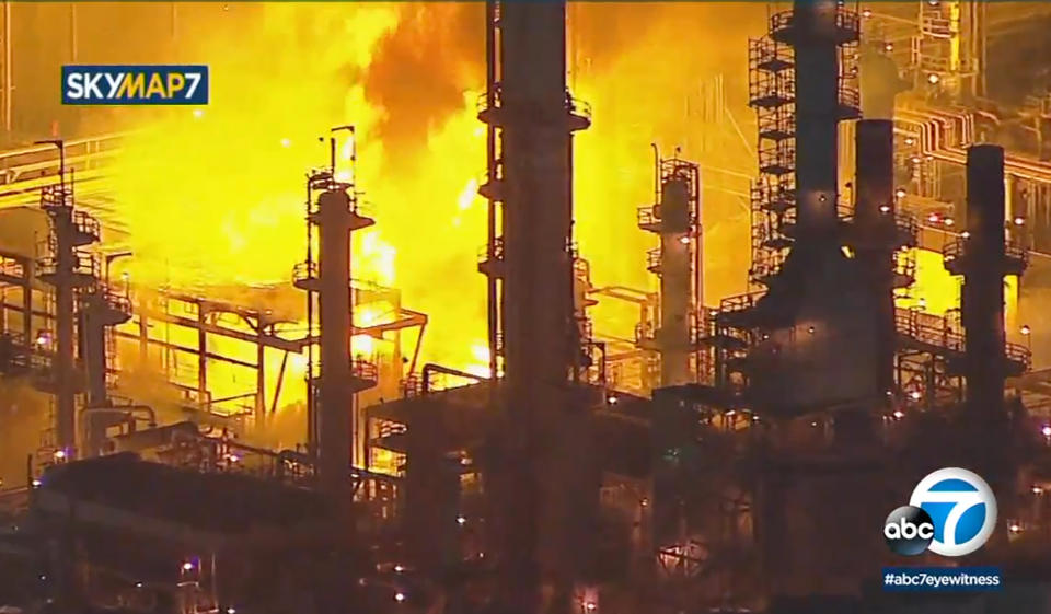 This Tuesday, Feb. 25, 2020, photo taken from KABC-TV video shows a fire at a large refinery at the Marathon Petroleum refinery in the city of Carson, Calif., south of Los Angeles. Firefighters were still pouring water onto part of the refinery early Wednesday but large flames from the fire had disappeared. No injuries were reported. Authorities could not immediately say what sparked the fire. (KABC-TV via AP)