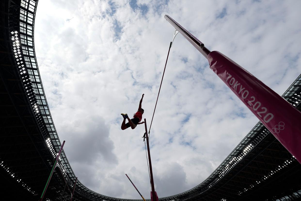 Seito Yamamoto, of Japan, competes during the qualification round of the men's pole vault at the 2020 Summer Olympics, Saturday, July 31, 2021, in Tokyo.