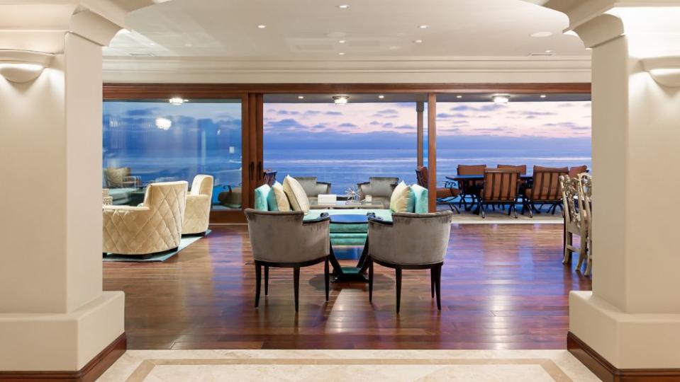 Retractable walls in the main living area offer panoramic views - Credit: Adrian Mora