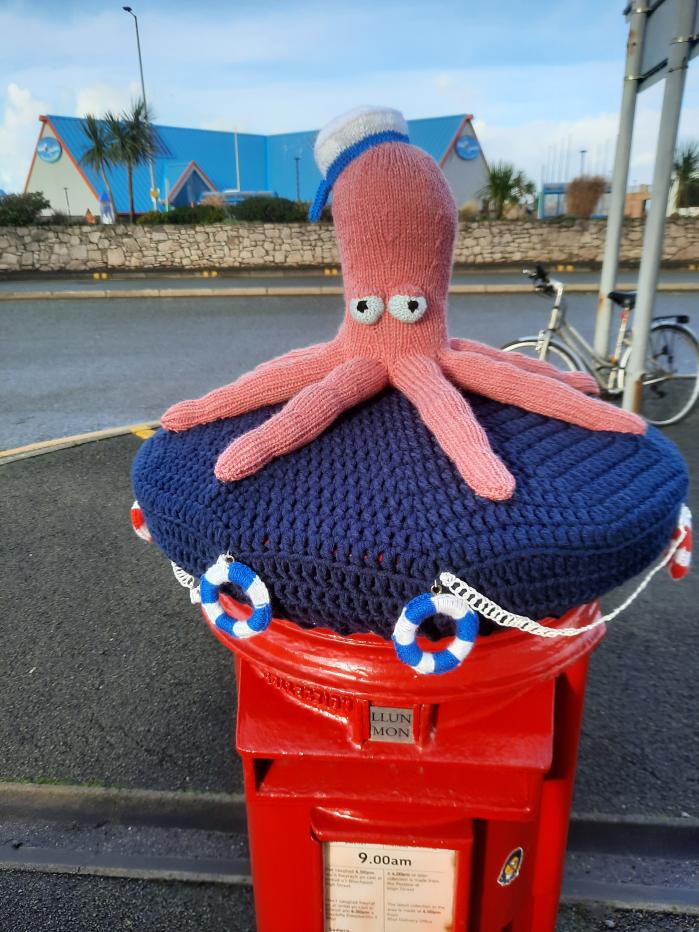 Rachel Williamson, a retired police officer, has been making postbox toppers in Rhyl, Wales, during the coronavirus pandemic