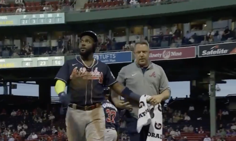 Marcell Ozuna leaves the game after a hand injury.