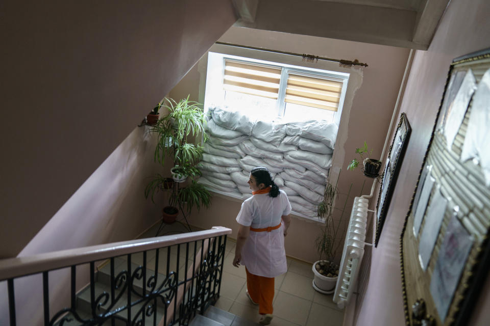 Sandbags are piled against a window inside the Pokrovsk Perinatal Hospital in Pokrovsk, Donetsk region, eastern Ukraine, Monday, Aug. 15, 2022. Russia and Moscow-backed separatists now occupy just over half the Donetsk region, which is similar in size to Sicily or Massachusetts. Pokrovsk is still in a Ukrainian government-controlled area 60 kilometers (40 miles) west of the front lines. Inside the hospital's maternity wards, talk of the war is discouraged. (AP Photo/David Goldman)