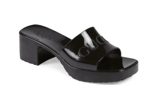 <p>The go-to designer shoe of the year, these rubber slides from the beloved Gucci brand go with just about any outfit.</p><p><strong><a href="https://go.skimresources.com?id=113896X1572730&xs=1&url=https%3A%2F%2Fwww.nordstrom.com%2Fs%2Fgucci-rubber-logo-platform-slide-sandal-women%2F5666362%3Fsiteid%3Dtv2R4u9rImY-cg.68qEyF6gOlHS_.JYApQ%26origin%3Dcategory-personalizedsort%26breadcrumb%3DHome%2FDesigner%2FWomen%2FDesigner%2520Shoes%26color%3D001%26utm_source%3Drakuten%26utm_medium%3Daffiliate%26utm_campaign%3Dtv2R4u9rImY%26utm_content%3D1%26utm_term%3D1080438%26utm_channel%3Dlow_nd_affiliates%26sp_source%3Drakuten%26sp_campaign%3Dtv2R4u9rImY&sref=parade.com%2Fshopping%2Fbest-gifts-under-100" rel="noopener" target="_blank" data-ylk="slk:Gucci Rubber Logo Platform Slides, $450 at Nordstrom;elm:context_link;itc:0;sec:content-canvas" class="link ">Gucci Rubber Logo Platform Slides, $450 at Nordstrom </a></strong></p><p>Nordstrom</p>