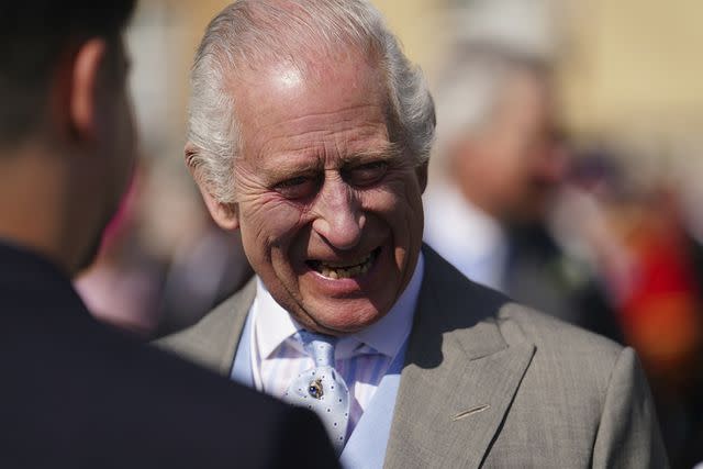<p>Press Association via AP Images</p> King Charles at a Buckingham Palace garden party on May 8, 2024.