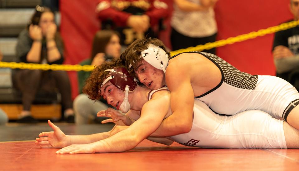 Bridgewater Raritan’s Michael Marsigliano (red) beats Hillsborough’s Corey Iannucci (green) in the 126 weight class at the 2023 Somerset County Boys Wrestling Tournament on Jan. 7 at the gymnasium at Hillsborough High School in Hillsborough.