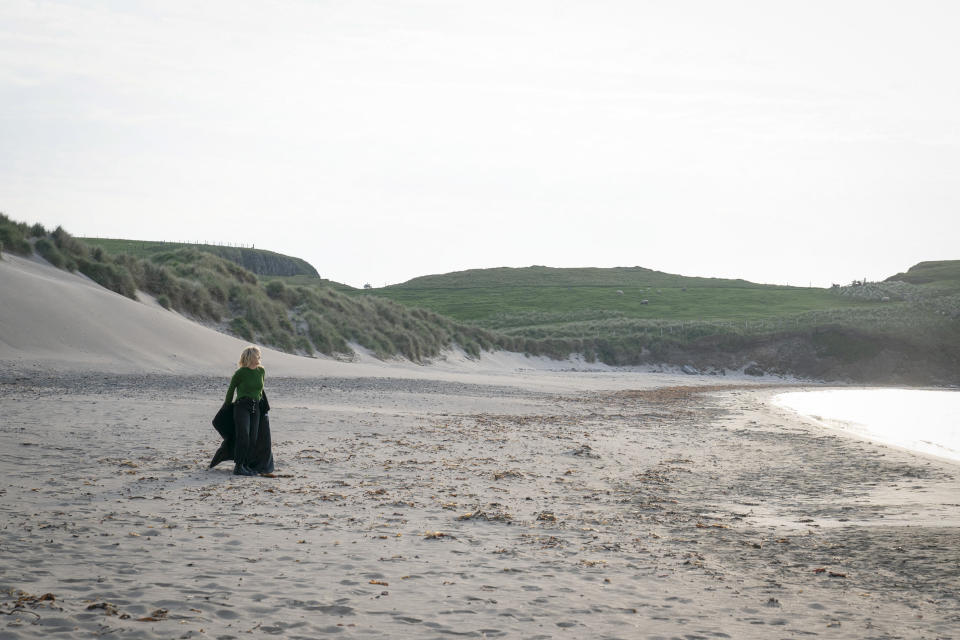 DI Ruth Calder (ASHLEY JENSEN) on the beach, running into the sea fully clothes in Shetland season 8