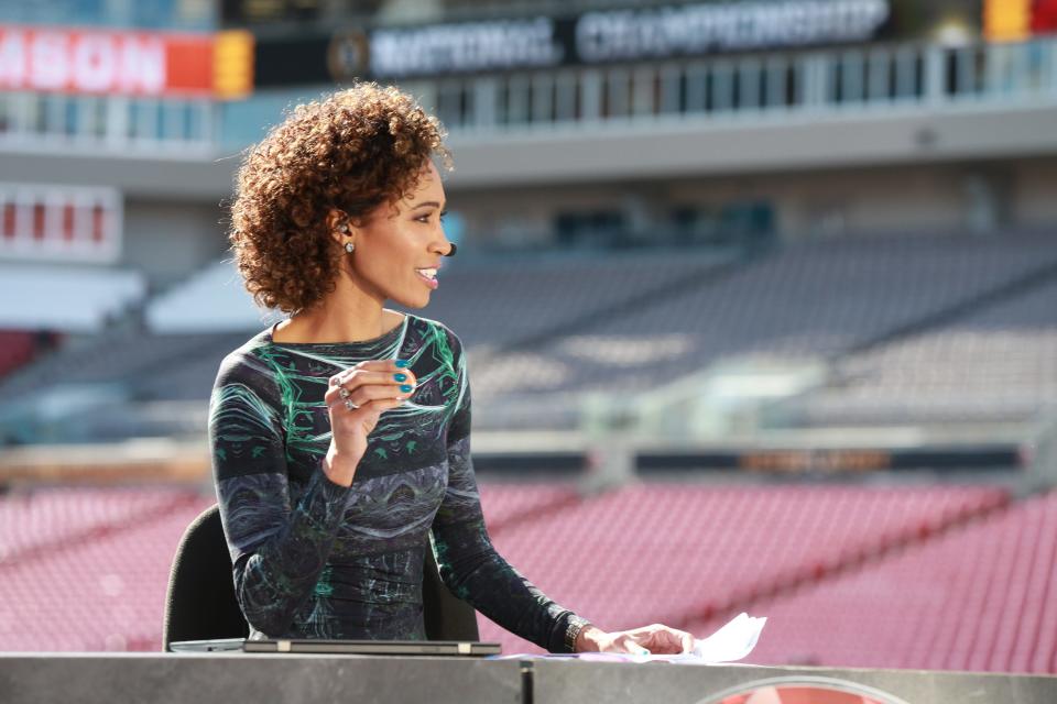 ESPN's Sage Steele broadcasts from the 2017 CFP National Championship Game in Tampa, Florida.
