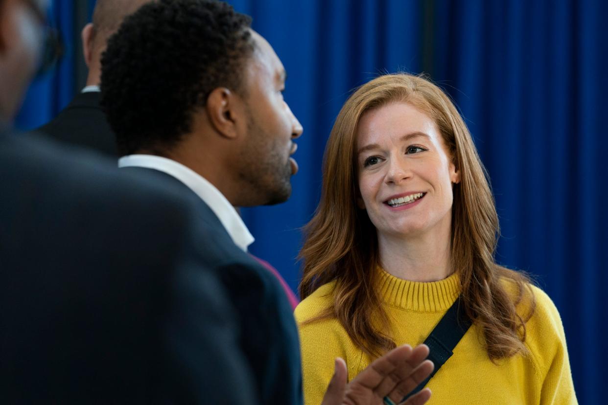 Adam Hollier, left, then Director of the Michigan Veterans Affairs Agency, speaks to State Sen. Mallory McMorrow before Michigan Gov. Gretchen Whitmer delivers her "What's Next" Address that outlines her legislative priorities for the fall at the Lansing Shuffle in Lansing Wednesday, Aug. 30, 2023.