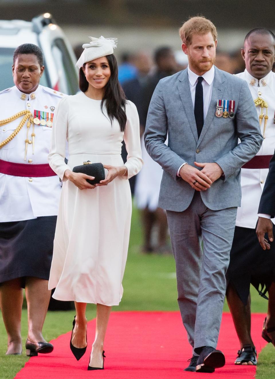 <p>Harry and <a href="https://www.townandcountrymag.com/style/fashion-trends/a24066587/meghan-markle-zimmerman-royal-tour-fiji-photos/" rel="nofollow noopener" target="_blank" data-ylk="slk:Meghan have landed in Fiji!;elm:context_link;itc:0;sec:content-canvas" class="link ">Meghan have landed in Fiji!</a> For their arrival, the Duchess wore a white dress by <a href="https://www.instagram.com/zimmermann/?hl=en" rel="nofollow noopener" target="_blank" data-ylk="slk:Zimmermann;elm:context_link;itc:0;sec:content-canvas" class="link ">Zimmermann</a> with a matching Stephen Jones fascinator. She also wore a straw clutch by Kayu with a pair of heels by Tabitha Simmons.</p><p><a class="link " href="https://go.redirectingat.com?id=74968X1596630&url=https%3A%2F%2Fwww.bloomingdales.com%2Fshop%2Fproduct%2Ftabitha-simmons-womens-millie-slingback-pointed-toe-pumps%3FID%3D2956738&sref=https%3A%2F%2Fwww.townandcountrymag.com%2Fstyle%2Ffashion-trends%2Fg3272%2Fmeghan-markle-preppy-style%2F" rel="nofollow noopener" target="_blank" data-ylk="slk:SHOP NOW;elm:context_link;itc:0;sec:content-canvas">SHOP NOW</a> <em>Millie Slingback Pumps by Tabitha Simmons, $695</em></p><p><a class="link " href="https://go.redirectingat.com?id=74968X1596630&url=https%3A%2F%2Fwww.shopbop.com%2Fanna-straw-clutch-kayu%2Fvp%2Fv%3D1%2F1560096446.htm&sref=https%3A%2F%2Fwww.townandcountrymag.com%2Fstyle%2Ffashion-trends%2Fg3272%2Fmeghan-markle-preppy-style%2F" rel="nofollow noopener" target="_blank" data-ylk="slk:SHOP NOW;elm:context_link;itc:0;sec:content-canvas">SHOP NOW </a><em>Kayu Anna Straw Clutch, $157.50</em></p>