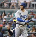 Los Angeles Dodgers' Trea Turner reacts after striking out during the first inning of a baseball against the Atlanta Braves, Sunday, June 26, 2022, in Atlanta. (AP Photo/Bob Andres)