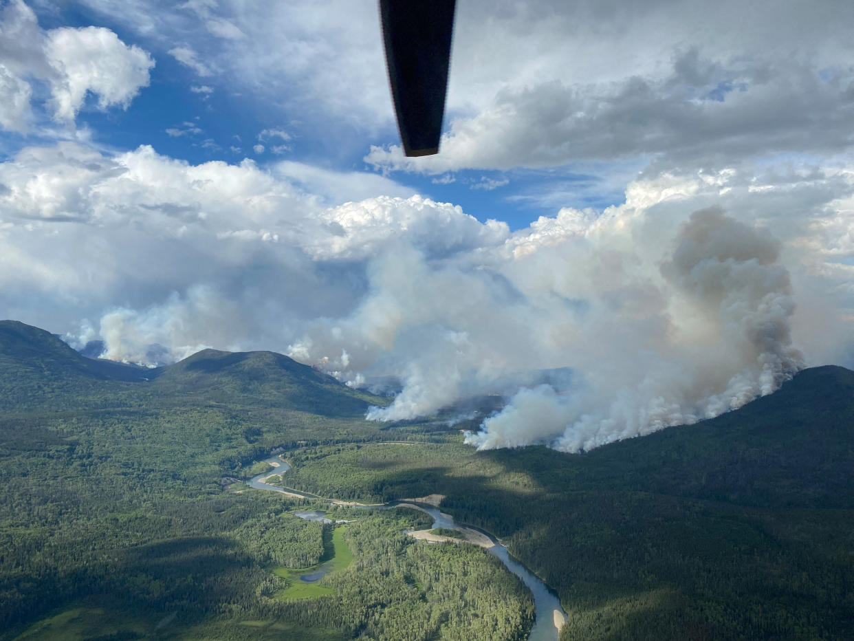 Smoke rises from the Big Creek wildfire, about 110 kilometres (68 miles) northwest of Mackenzie, British Columbia, Canada June 29, 2023.  (BC Wildfire Service/Handout via Reuters)