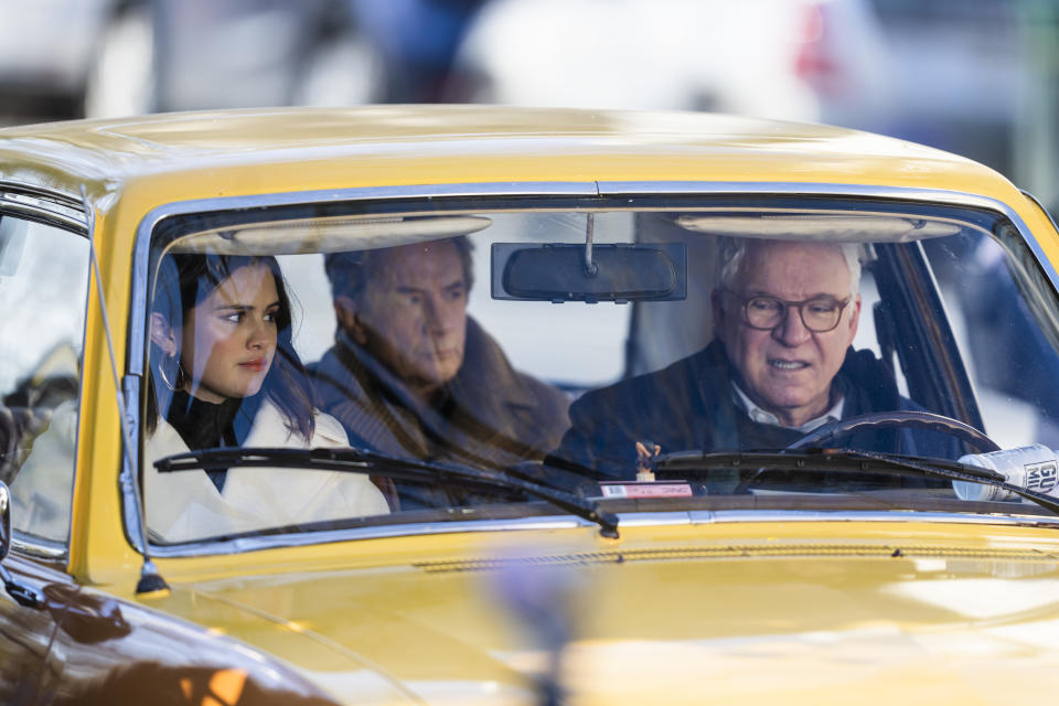 Selena Gomez, Martin Short, and Steve Martin sit in a car while filming "Only Murders in the Building"