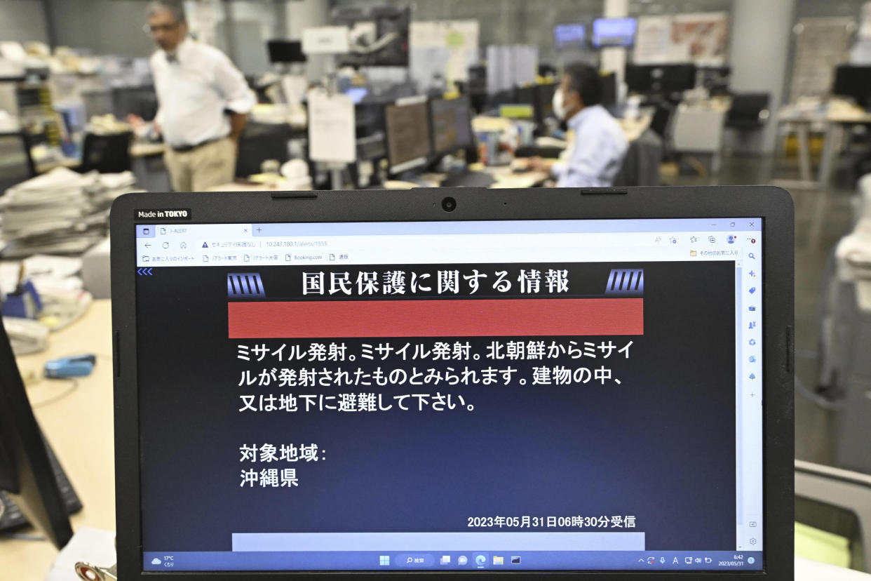 A monitor in Tokyo shows J-Alert or National Early Warning System to the residents in Okinawa, southern Japan, Wednesday, May 31, 2023. South Korea’s military says North Korea has launched a purported space-launch vehicle after announcing a plan to put its first military spy satellite into orbit. The screen reads " Missile launched. Seems missile was launched from North Korea. Please take shelter inside buildings or underground. " (Kyodo News via AP)