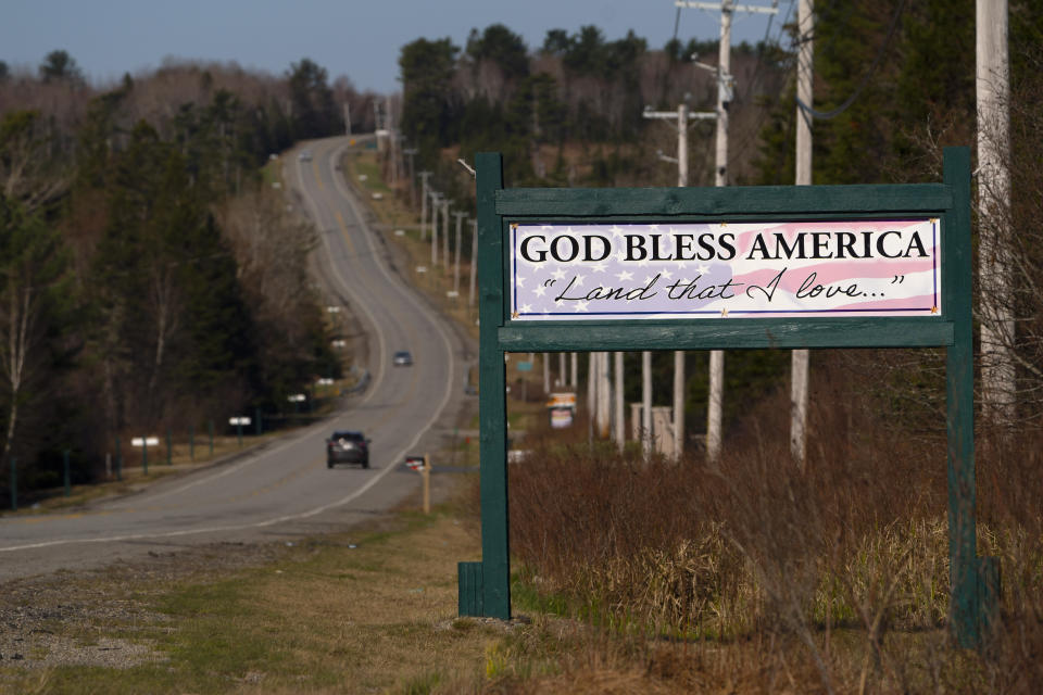 A patriotic sign stands on the side of U.S. 1, Friday, April 28, 2023, in Columbia Falls, Maine. (AP Photo/Robert F. Bukaty)