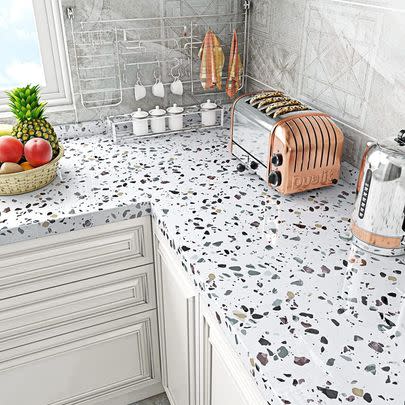 Waterproof terrazzo-style paper for a budget-friendly counter treatment