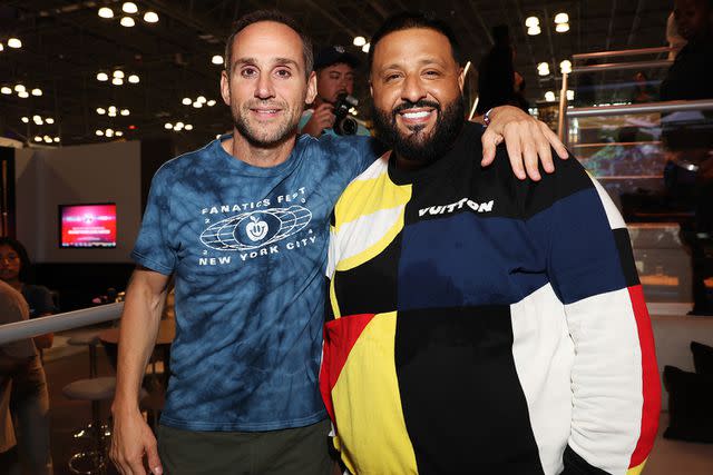 <p>Kevin Mazur/Getty</p> Michael Rubin and DJ Khaled