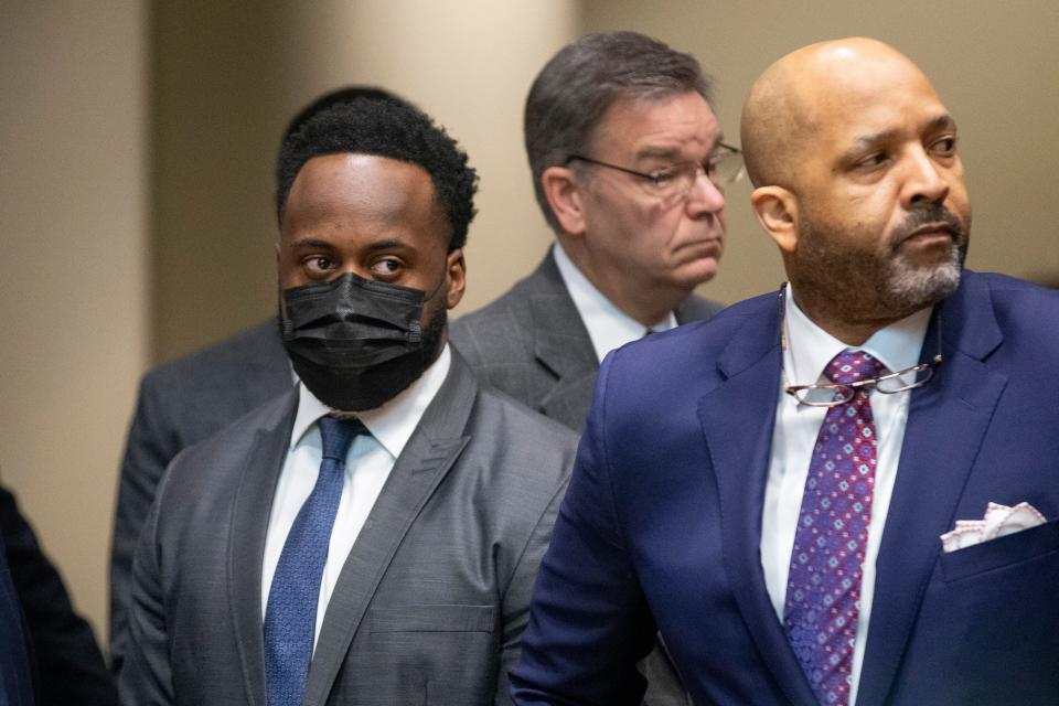 Tadarrius Bean, one of the officers charged with the beating of Tyre Nichols, stands next to his defense attorney John Keith Perry during a hearing where he and the other officers plead not guilty at the Shelby County Criminal Justice Center in Memphis, on Friday, February 17, 2023. 