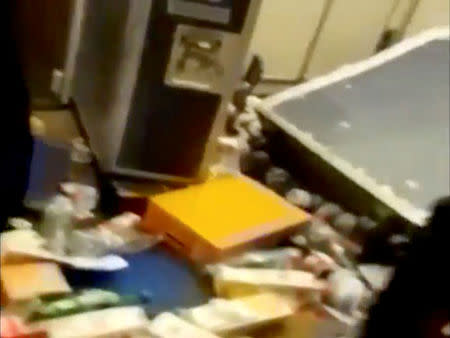 A still image from video shows plane kitchenware and cabinet fallen over onboard an Aeroflot Boeing 777 flight from Moscow to Bangkok after it hit turbulence, May 1, 2017. MANDATORY CREDIT Provided by RR/Rostik Rusev/Handout via Reuters TV