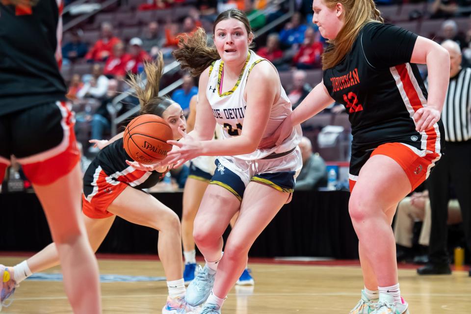 Greencastle-Antrim's Ainsley Swindell keeps her handle on the ball during the District 3 Class 5A girls' basketball championship against York Suburban at the Giant Center on March 2, 2023, in Derry Township. The Blue Devils won, 44-30.