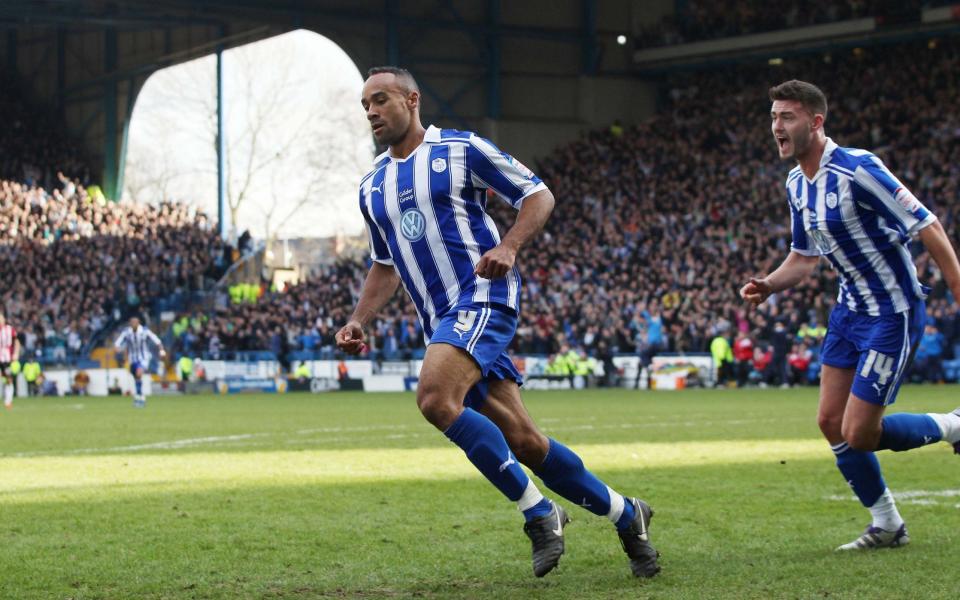 Chris O'Grady celebrates scoring the only goal of the last Sheffield derby to give Wednesday the bragging rights for more than five years - Action Images