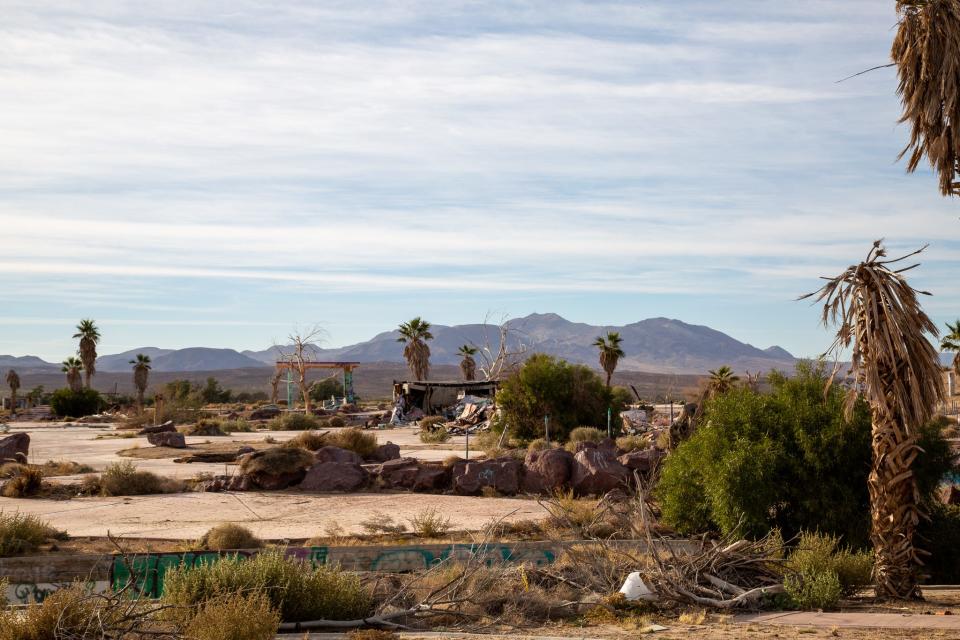 A view of the water park with mountains in the distance.