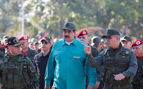 Venezuela's President Nicolas Maduro takes part in a military exercise in Valencia - Credit: Reuters