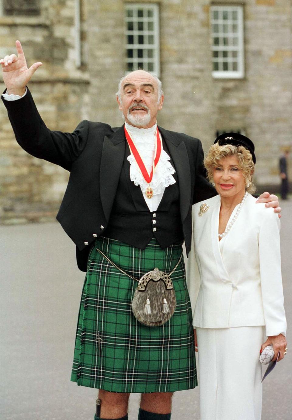 Sir Sean Connery, with wife Micheline, donning full Highland dress (PA) (PA Archive)