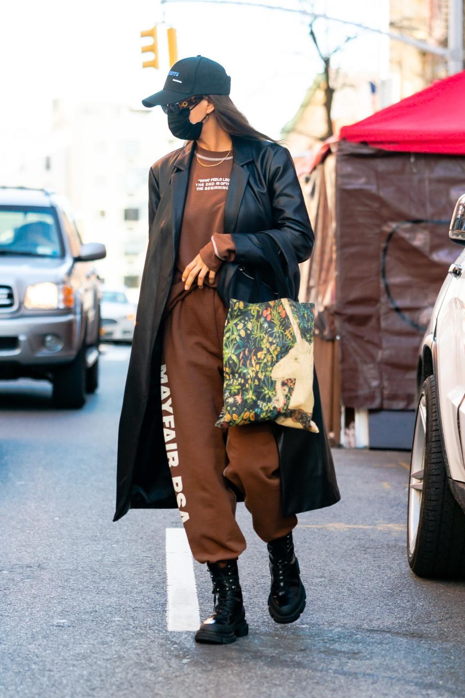 Irina Shayk styled the Mango Leather Coat with a tracksuit and chunky biker boots in New York over the weekend.  (Getty Images)