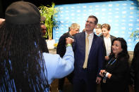 Jim Harbaugh shakes hands with supporters after a press conference introducing him as the new head coach of the Los Angeles Chargers NFL football team Thursday, Feb. 1, 2024, in Inglewood, Calif. (AP Photo/Ashley Landis)