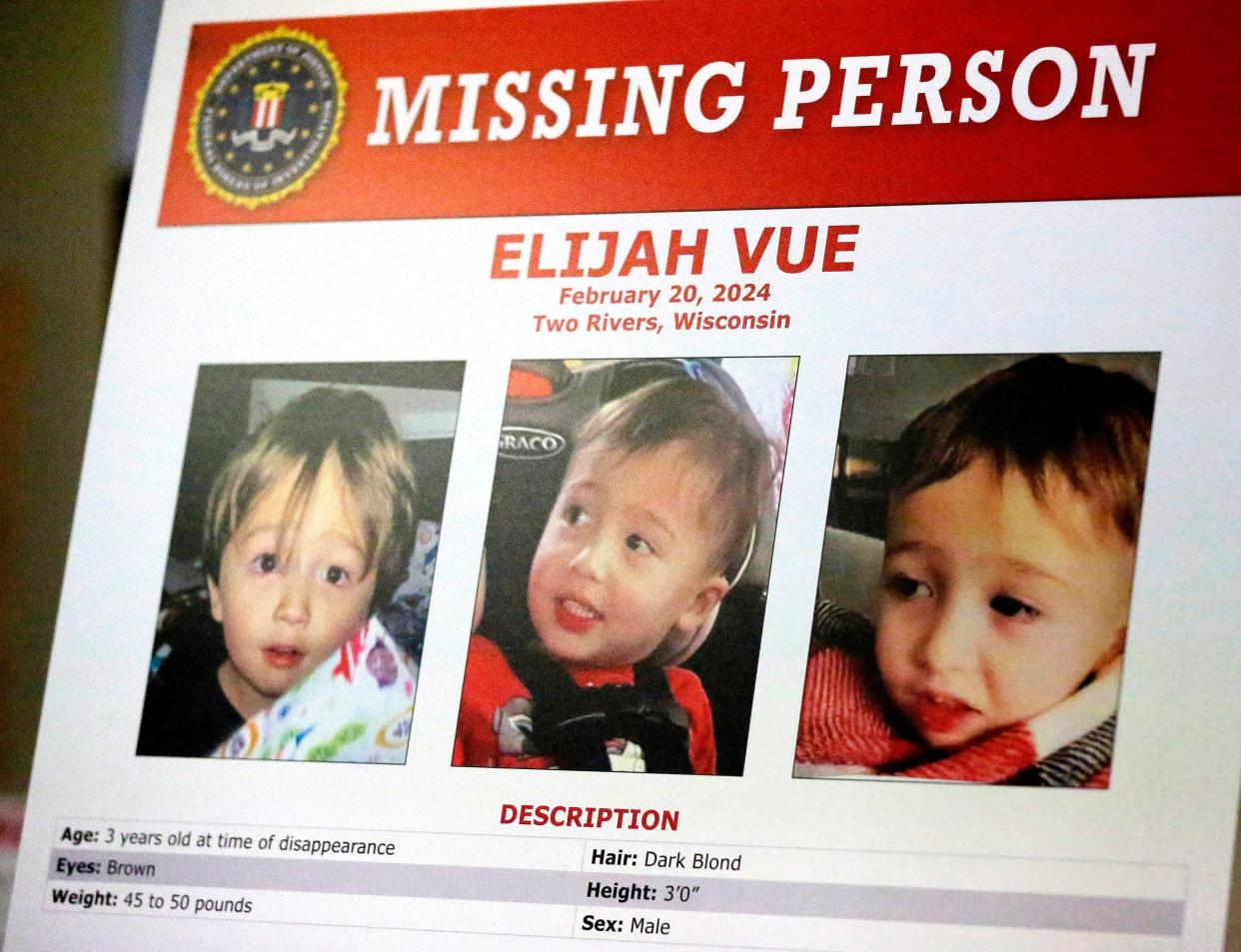 A missing person poster was on display at the press conference held at the Two Rivers city hall to help find three-year-old Elijah Vue, Tuesday, February 27, 2024, in Two Rivers, Wis.