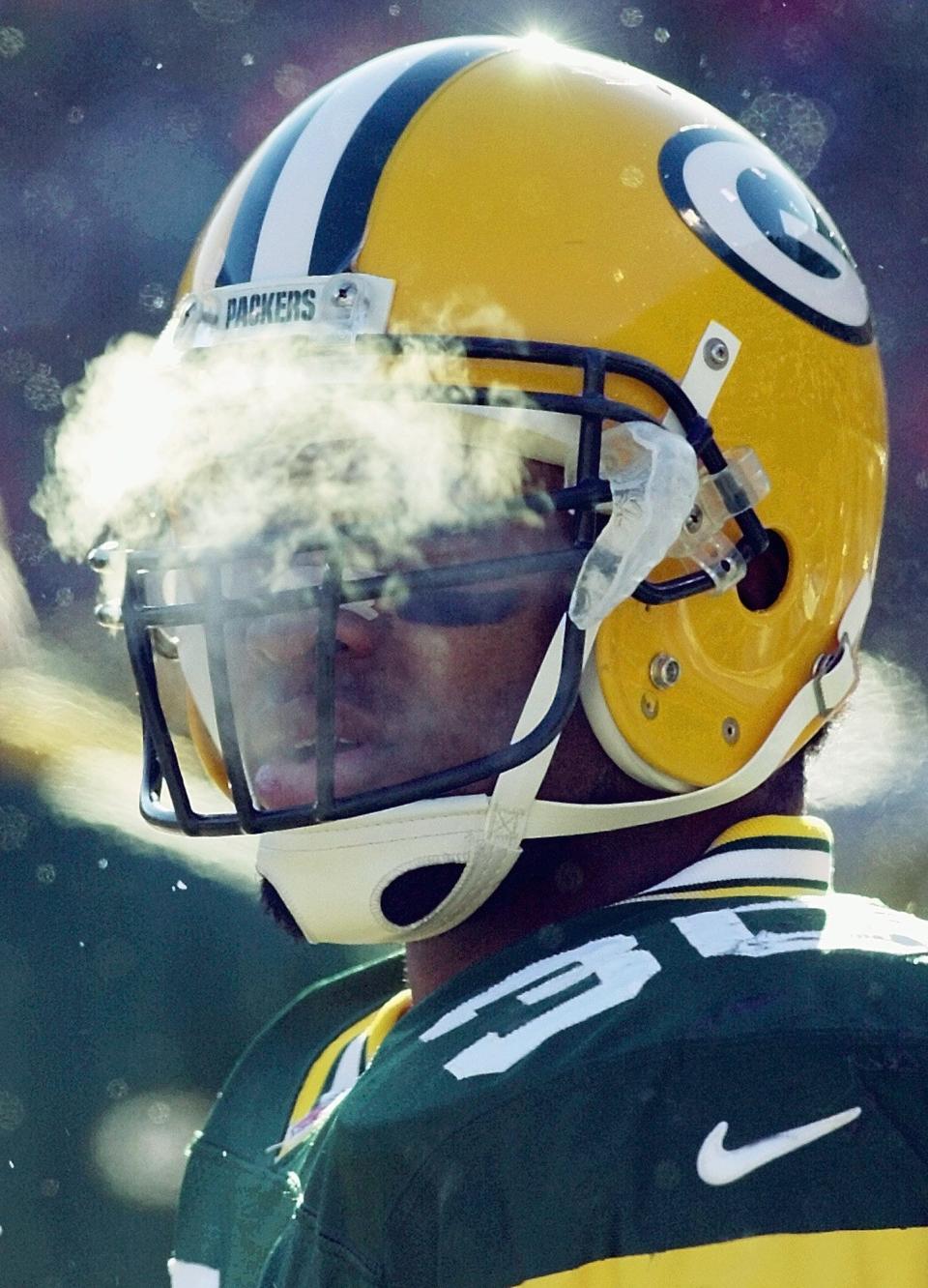 Packers running back Ahman Green stands on the Lambeau Field sidelines against the Buccaneers.