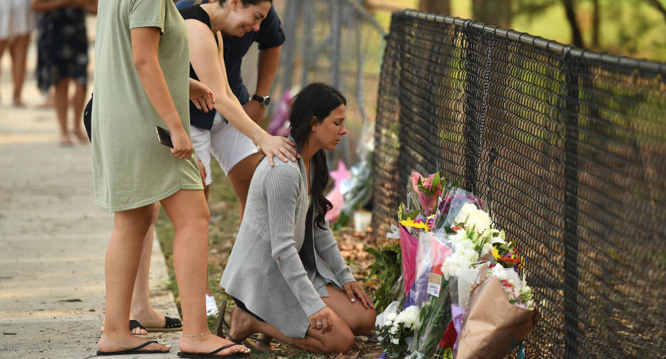 Leila Geagea at a makeshift memorial where three of her children were killed by a four-wheel-drive in Oatlands, Sydney.