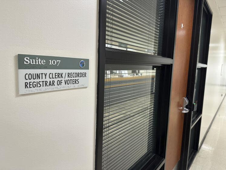 A sign marks an office at the Yuba County Registrar of Voters building in Marysville, Calif. on Wednesday, Jan. 17, 2024. Authorities are investigating a suspicious envelope sent to the elections office in Yuba County on Wednesday morning that might have contained fentanyl. (AP Photo/Adam Beam)